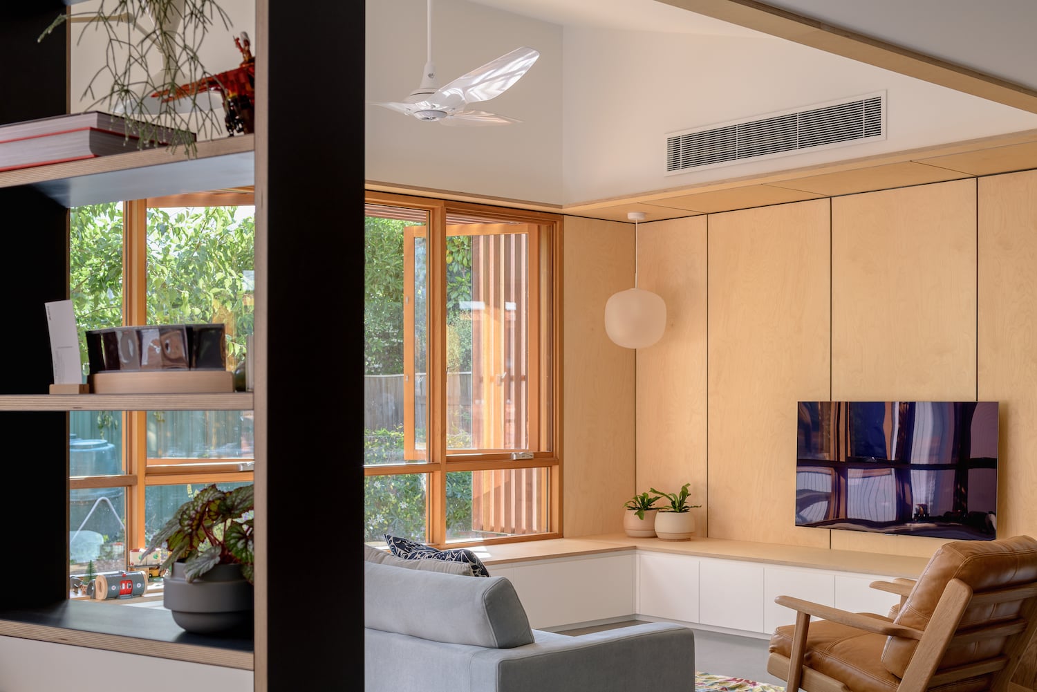 White ceiling fan installed in a modern residential living room